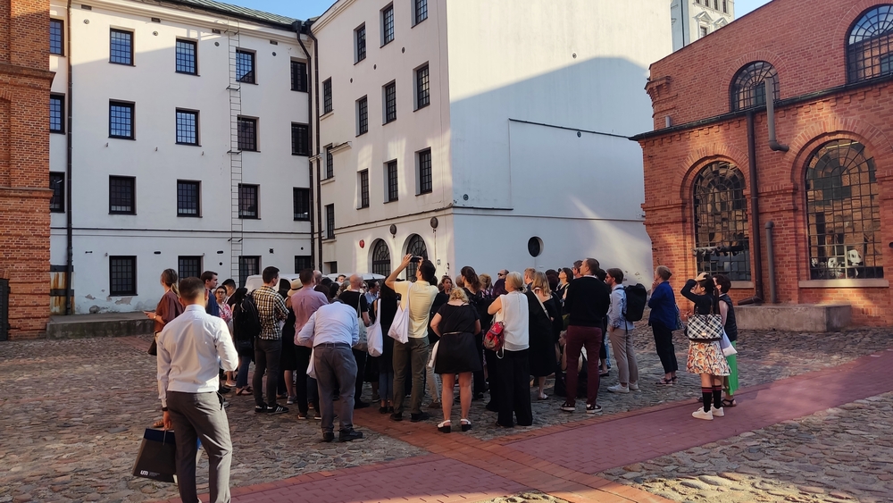 The conference participants during a walk around the patio of the Central Museum of Textiles