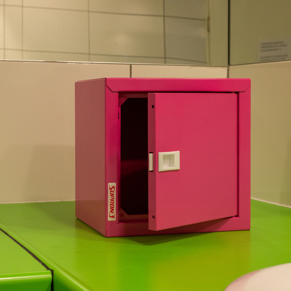 One of the pink boxes