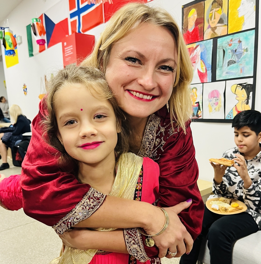 Diwali Festival at the school - mother with daugther wearing Indian clothes