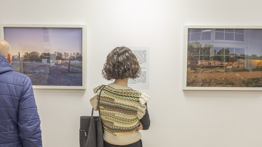 A woman looking at photographs