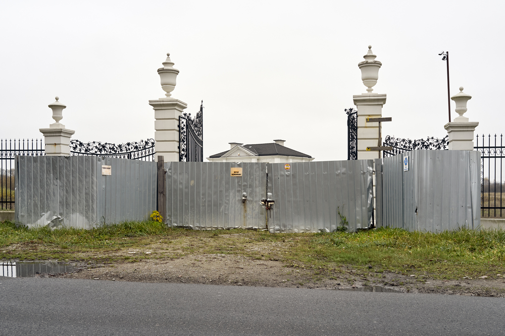 a richly decorated residential house in the suburbs temporarily covered with sheet metal during construction